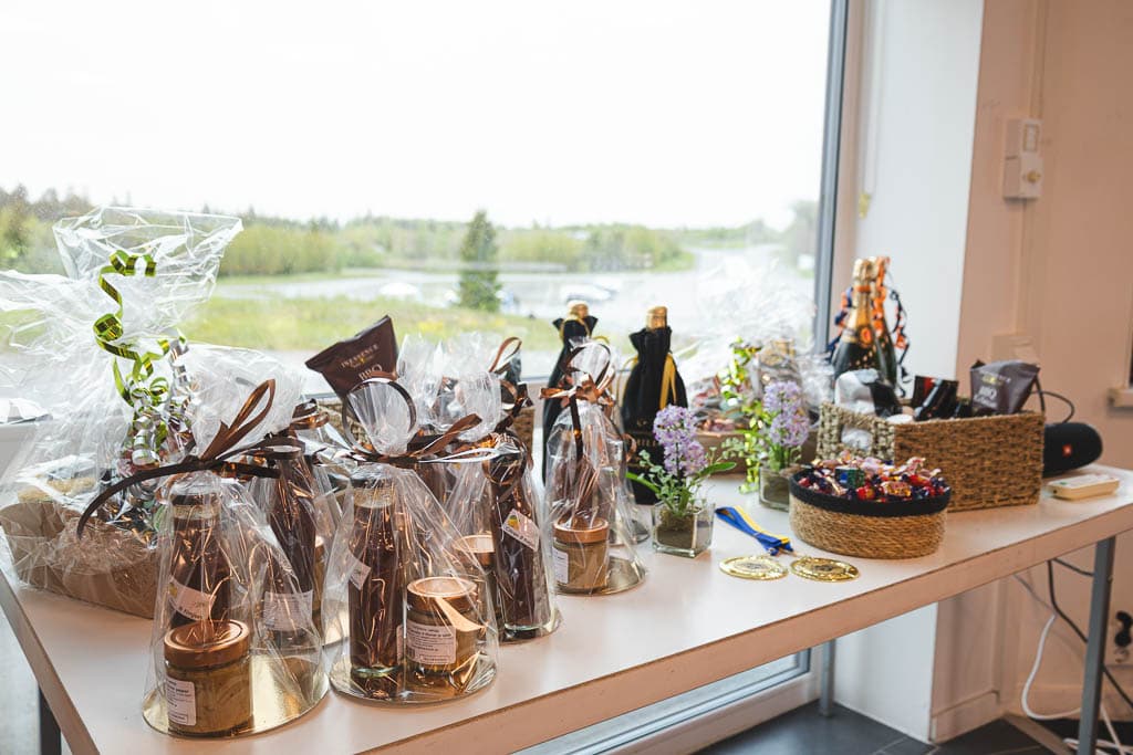 a table with a group of bottles wrapped in plastic