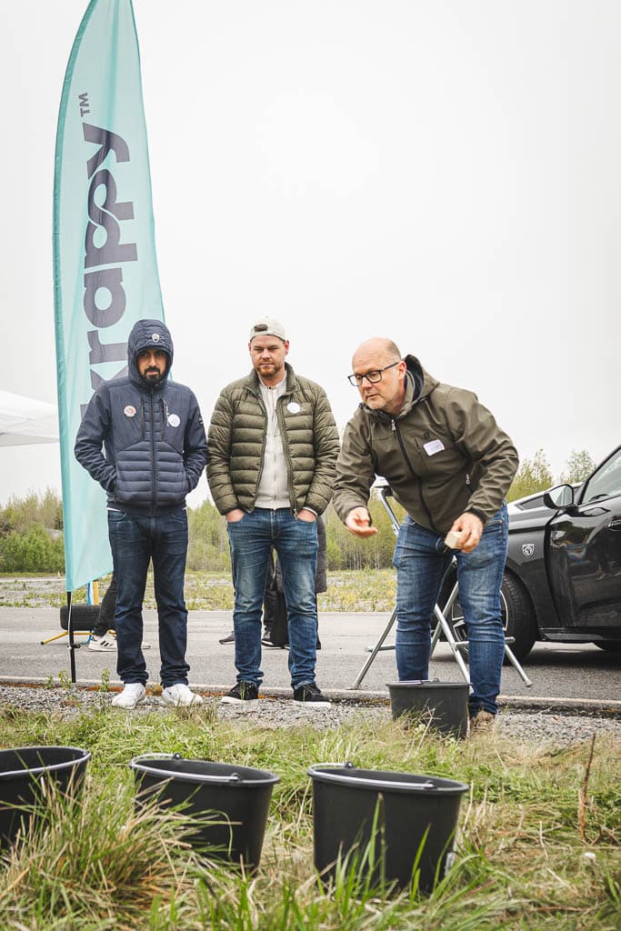 a group of men standing outside