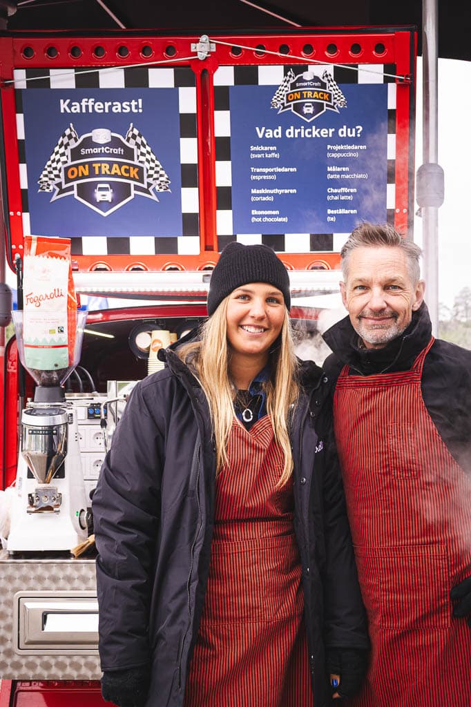 a man and woman standing next to each other